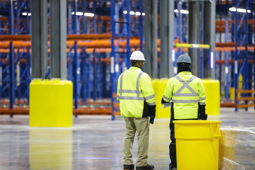 Workers working in a cold storage warehouse